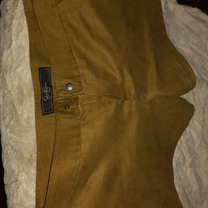 Jessica Simpson brown 100% polyester. Size 29 even though short very comfortable